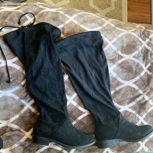 Suede stretch knee-high boots that tie in the back